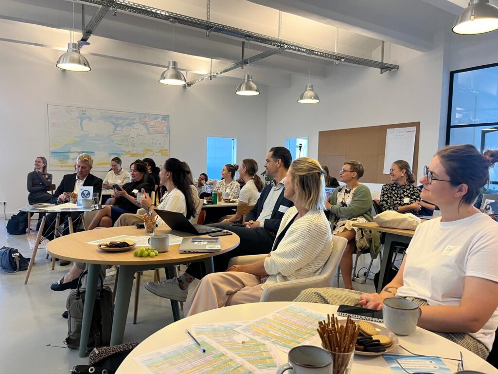 Partners following a presentation at the BlueMissionBANOS2030 kick-off meeting in Berlin